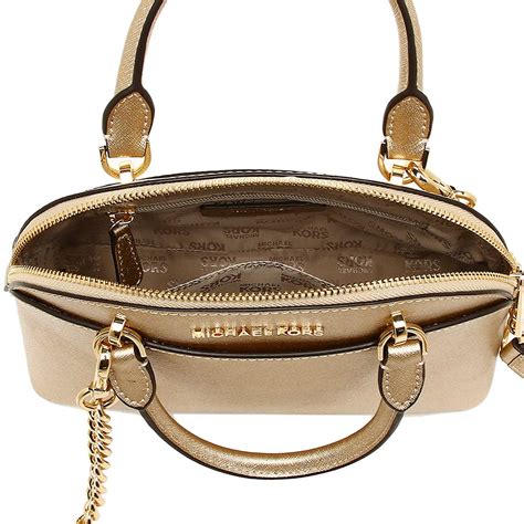 michael kors black bag with gold trim|Michael Kors gold handbag sale.